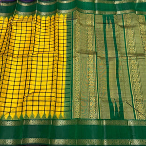 Yellow with Bottle Green Handwoven Pure Zariless Korvai Kanjivaram Silk Saree with doublepet temple borders beauty