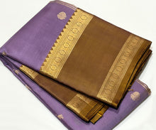 Sahana- Gorgeous Lavendar with Bronze Gold Combo in a Handwoven Pure Jari Kanjivaram Silk with elephants annapakshis and deer motits woven all over the body with beautiful rudrakshas woven rettapet borders with gorgeous pallu and contrast woven blouse