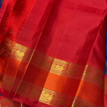 Vaibhogam-Gorgeous Deep Blue Orange Red Handwoven Pure Zari Kanijivaram Silk with rich jari checks and meena buttas woven beautiful body with rich borders pallu very intricately woven and contrast woven blouse