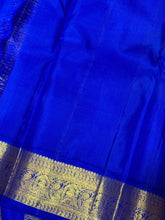 Sarasangi- Stunning Dual Tone Tomato Pink with Royal Blue Handwoven Pure Jari Korvai Kanjivaram Silk with beautifully woven borders rich pallu and contrast blue blouse