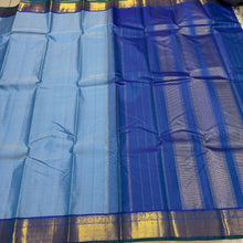 Nayaki- Gorgeous Powder Blue with Peacock Blue Handwoven Pure Jari Kanjivaram Silk with bawanchi borders rich seer pallu and contrast woven blouse