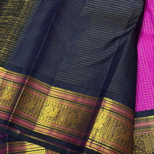 Vaibhogam- Stunning Magenta with dark kanchana blackish Blue Vairaoosi checks Handwoven Pure Jari Korvai Kanjivaram Silk with Rettaikili buttas woven body, beautiful borders rich pallu with bird buttas and contrast Vairaoosi woven blouse