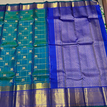 Gorgeous Peacock Blue Green with Royal Blue Handwoven Pure Jari Kanjivaram Silk Saree with Rettaikili motifs in Jari Checked body rich borders Pallu and Contrast woven blouse