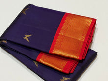 Vaibhogam- Navy Blue with Red Handwoven Pure Jari Korvai Kanjivaram Silk with Rettaikili buttas woven beautiful body with rich borders gorgeous rettaikili buttas woven rich pallu and contrast woven beautiful blouse