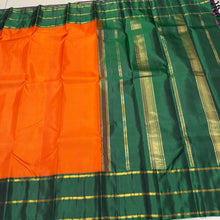 Sarasangi- Orange with Bottle Green Handwoven Pure Jari Korvai Kanjivaram Silk with podikattam woven body beautiful borders rich seer pallu and contrast woven blouse