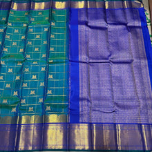Gorgeous Peacock Blue Green with Royal Blue Handwoven Pure Jari Kanjivaram Silk Saree with Rettaikili motifs in Jari Checked body rich borders Pallu and Contrast woven blouse
