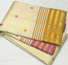 Sahana- Gorgeous Creamish White with Ganga Jamuna Pink and Mustard Rudrakshas woven beautiful borders rich golden mustard pallu and contrast golden mustard blouse