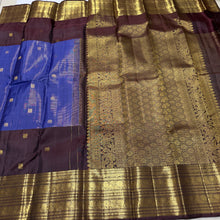 Vaibhogam- Gorgeous Ink Blue with Coffee Brown Vairaoosi with Buttas Handwoven Pure 2g Jari Kanjivaram Silk with beautiful small elephants and peacocks woven body and middle borderd and rich coffee brown borders pallu and contrast woven brown blouse