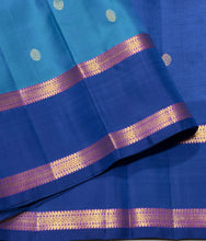 Sahana- Beautiful Blue with dark teal blue combination in a handwoven pure Jari Kanjivaram Silk with buttas woven body with rich borders beautiful pallu and contrast woven blouse
