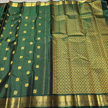 A Deep Emerald Green with Gold Vairaoosi with Buttas Handwoven Pure Jari Kanjivaram Silk Saree with rich borders pallu and self colored blouse beauty