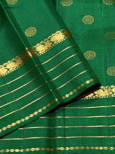 Sahana- Beautiful emerald green with gold handwoven Pure Kanjivaram Silk with beautiful chakram buttas and borders rich pallu and self colored blouse beauty