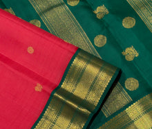 Vaibhogam- Gorgeous Tomato Red with Deep Emerald Green Handwoven Pure 2g Jari Korvai with Buttas Kanjivaram Silk with beautiful borders rich pallu and contrast woven blouse