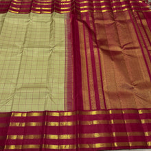 Vaibhogam- Stunning Pastel Green with Arakku Red Handwoven Pure Jari Korvai Kanjivaram Silk with Checked body and tetrapet beautifully woven borders rich finely woven pallu and contrast woven blouse
