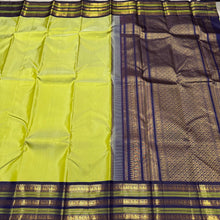 Gorgeous Pastel Green with Navy Blue Handwoven Pure Jari Korvai Plain Body Kanjivaram Silk Saree with rich Varisaipet Meenakari Borders Rich Pallu and Contrast Woven Blouse