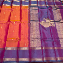 Orange with Lavendar Buttas with Simhayazhi Pallu Handwoven Pure Jari Kanjivaram Silk Saree Beauty with Rettapet Borders