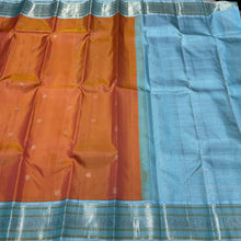 Dual tone Soft Orange with Powder Blue Buttas Handwoven Kai Korvai Kanjivaram Silk Saree with Rich borders pallu and contrast woven blouse beauty