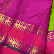Vaibhogam -Gorgeous Parrot Green with Pink Vairaoosi Handwoven Pure Korvai Kanjivaram Silk with doublepet borders in pink and orange shades with rich pallu and contrast Vairaoosi woven beautiful blouse
