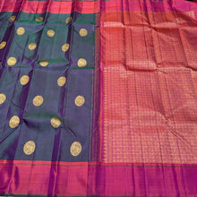 Dual tone Green Short with Orange Buttas Handwoven Pure Jari Kanjivaram Silk Saree with rich pallu and contrast woven blouse