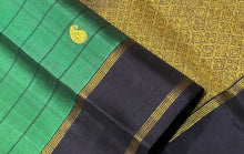 Sahana- Gorgeous Emerald Green with Black Handwoven Pure Jari Checked Kanjivaram Silk with paisleys woven checks with beautiful rettapet bodi borders gorgeous pallu and contrast woven black blouse
