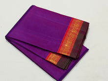 Nayaki- Gorgeous Vadamalli Purple with Double tone Orange and beautiful Green Selvedges Handwoven Pure Jari Kanjivaram Silk with Small borders rich pallu and contrast woven beautiful blouse