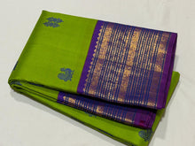 Vaibhogam- Mesmerizing Parrot Green with Violetish Purple Handwoven Pure Jari Korvai Kanjivaram Silk with Pattu buttas woven body with rich borders gorgeous pallu and contrast woven blouse