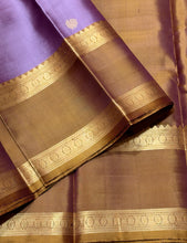 Sahana- Gorgeous Lavendar with Bronze Gold Combo in a Handwoven Pure Jari Kanjivaram Silk with elephants annapakshis and deer motits woven all over the body with beautiful rudrakshas woven rettapet borders with gorgeous pallu and contrast woven blouse