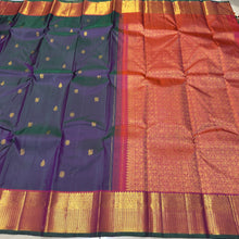Sahana- Gorgeous Dual tone Manthulir Green with Rustic Orange Handwoven Pure Jari Kanjivaram Silk with beautiful buttas woven body rich mayilkan and chakram woven borders gorgeous pallu and contrast woven blouse