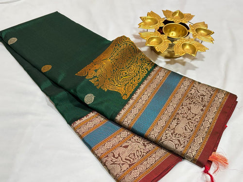Dark Bottle Green with Manthulir buttas with Corner Buttas Konia Pallu with Varisaipet borders Handwoven Pure Zariless Kanchipuram Silk Saree Beauty