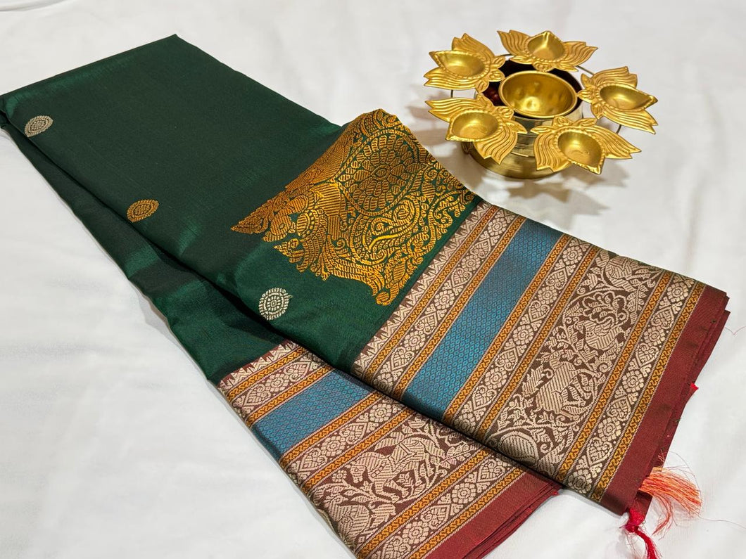 Dark Bottle Green with Manthulir buttas with Corner Buttas Konia Pallu with Varisaipet borders Handwoven Pure Zariless Kanchipuram Silk Saree Beauty