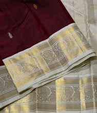 Vaibhogam- Gorgeous Deep Maroon with Mustard and Offwhite Handwoven Pure Jari Korvai Kanjivaram Silk with buttas woven body rich borders dancing women and musical instruments woven pallu and contrast woven blouse