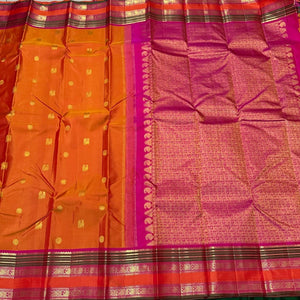 Mango Orange with Rani Pink Buttas with rettapet borders Handwoven Pure Jari Kanjivaram Silk Saree Beauty