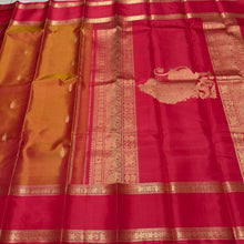 Sahana- Gorgeous Double tone Golden Mustard Shot color body with red combo in a beautiful handwoven pure Kanjivaram Silk with thilagam buttas woven with beautiful rettapet borders gorgeous simhayazhi motif woven pallu with a contrast woven red blouse
