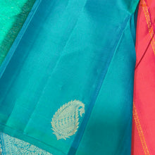 Saranga- Gorgeous Dual tone Orange With Turquoise Green Borderless Handwoven Pure Jari Kanjivaram Silk with Muthukattam woven body with beautiful paisley motifs rich 1000 buttas style woven pallu and contrast woven blouse