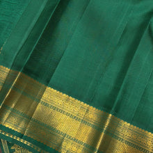 Vaibhogam- Gorgeous Tomato Red with Deep Emerald Green Handwoven Pure 2g Jari Korvai with Buttas Kanjivaram Silk with beautiful borders rich pallu and contrast woven blouse