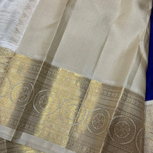 Vaibhogam -Gorgeous Royal Blue with Offwhite Handwoven Pure Jari Korvai Kanjivaram Silk Saree with Beautiful Buttas Woven Body rich and Intricate Borders Pallu and Contrast woven blouse