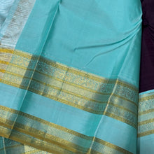 Gorgeous Dark Kanchana Brown with dual tone aqua blue green Handwoven Pure Jari Korvai Kanjivaram Silk Saree with Rich Peacock Buttas Woven body beautiful borders rich pallu with intricate motifs and contrast woven blouse
