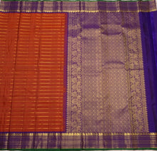 Sahana- Stunning  Burnt Orange with Purple Handwoven Pure Jari Kanjivaram Silk with Jari Veldhari Body with rich borders pallu and contrast woven blouse