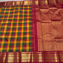 Gorgeous Palum Pazhamum Checks in a beautiful Korvai Handwoven Pure Jari Kanjivaram Silk Saree with very intricately woven vanki borders and inbetween mayilkan motifs woven with rich and finely woven pallu in arakku with laksham buttas and contrast blouse