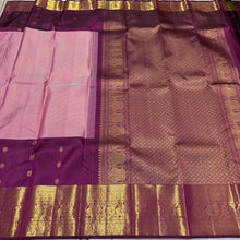 Vaibhogam- Mesmerizing Lotus Pink with Dark Magenta Purple Handwoven Pure 2g Jari KanjivaramSilk with Jarioosi checked body with beautiful mayil chakram motifs woven middle borders with beautiful long and short lower borders pallu and contrast wove blouse