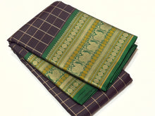Saraswati- Gorgeous Coffee Brown with  Deep Emerald Green Handwoven Premium Zariless Kanjivaram Silk with beautiful muthukattam silk checked body with gorgeous varisaipet borders rich sorgavaasal pallu and contrast woven blouse