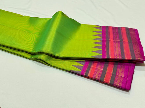 Parrot Green with Fuchsia Pink Handwoven Pure Jari Korvai with Temple woven Varisaipet Borders Kanjivaram Silk Saree Beauty
