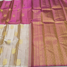 Sahana- Gorgeous Beige with Onion Pink Handwoven Pure 2g Jari Kanjivaram Silk in Half and Half Style with Muthukattam aith buttas woven body with rich onion pink pallu and contrast blouse