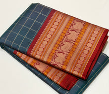 Saraswati- Gorgeous Teal Blue wkth Maroonish Red Handwoven Premium Zariless Kanjivaram Silk with beautiful muthukattam silk checked body with gorgeous varisaipet borders rich sorgavaasal pallu and contrast woven blouse