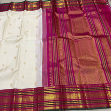 Vaibhogam-Gorgeous Offwhite with Pink Handwoven Pure Jari Korvai with Buttas Kanjivaram Silk with beautiful varisaipet borders and green selvedges rich pallu and contrast woven pink blouse