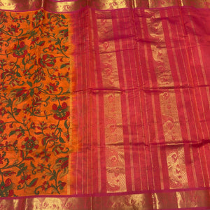 Bright Orange with dual tone Orange Handwoven Pure Kanjivaram Semicontrast Silkcotton Saree with Hand Pichwai Block Printed Beauty