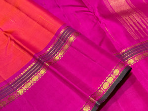 Double tone Orange with Pink with Mallimoggu Buttas and Doublepet Borders in a Handwoven Pure Kanjivaram Silk Saree Beauty