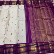 Vaibhogam- Gorgeous Offwhite with Purple Handwoven Pure Zari Korvai Kanjivaram Silk with Pattu Buttas woven body with rich varisaipet borders with beautiful pallu and contrast woven purple blouse