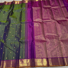 Nayaki- Gorgeous Dual tone Green with Purple Handwoven Pure Kanjivaram Silk with Buttas woven body rich borders pallu and contrast woven blouse