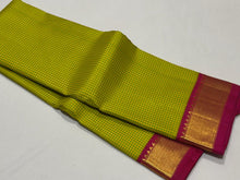 Sarasangi- Stunning  green and yellow with Tomato pink Handwoven Pure Jari Korvai Kanjivaram  Silk with beautiful kasakasa podikattam woven body with rich borders beautiful and intricate pallu and contrast woven blouse