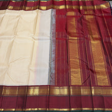 Sarasangi- Gorgeous Creamish White with Deep Brown Handwoven Pure Jari Korvai Kanjivaram Silk with beautiful borders green selvedges rich pallu and contrast woven blouse